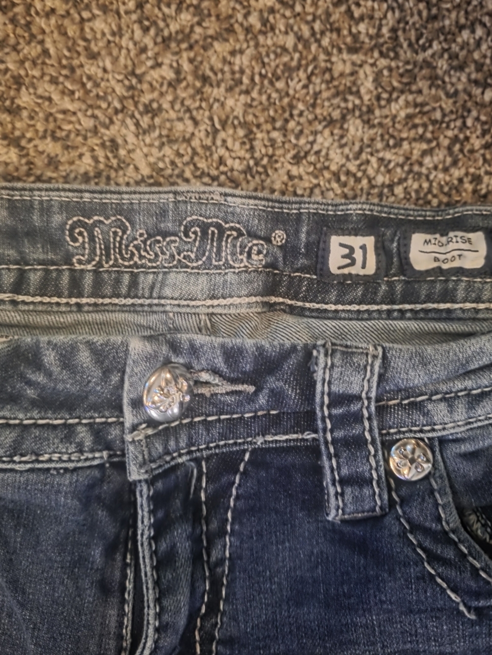 Miss Me Indigo Wash Jeans with Silver Wings On Back Pockets. Size 31×33